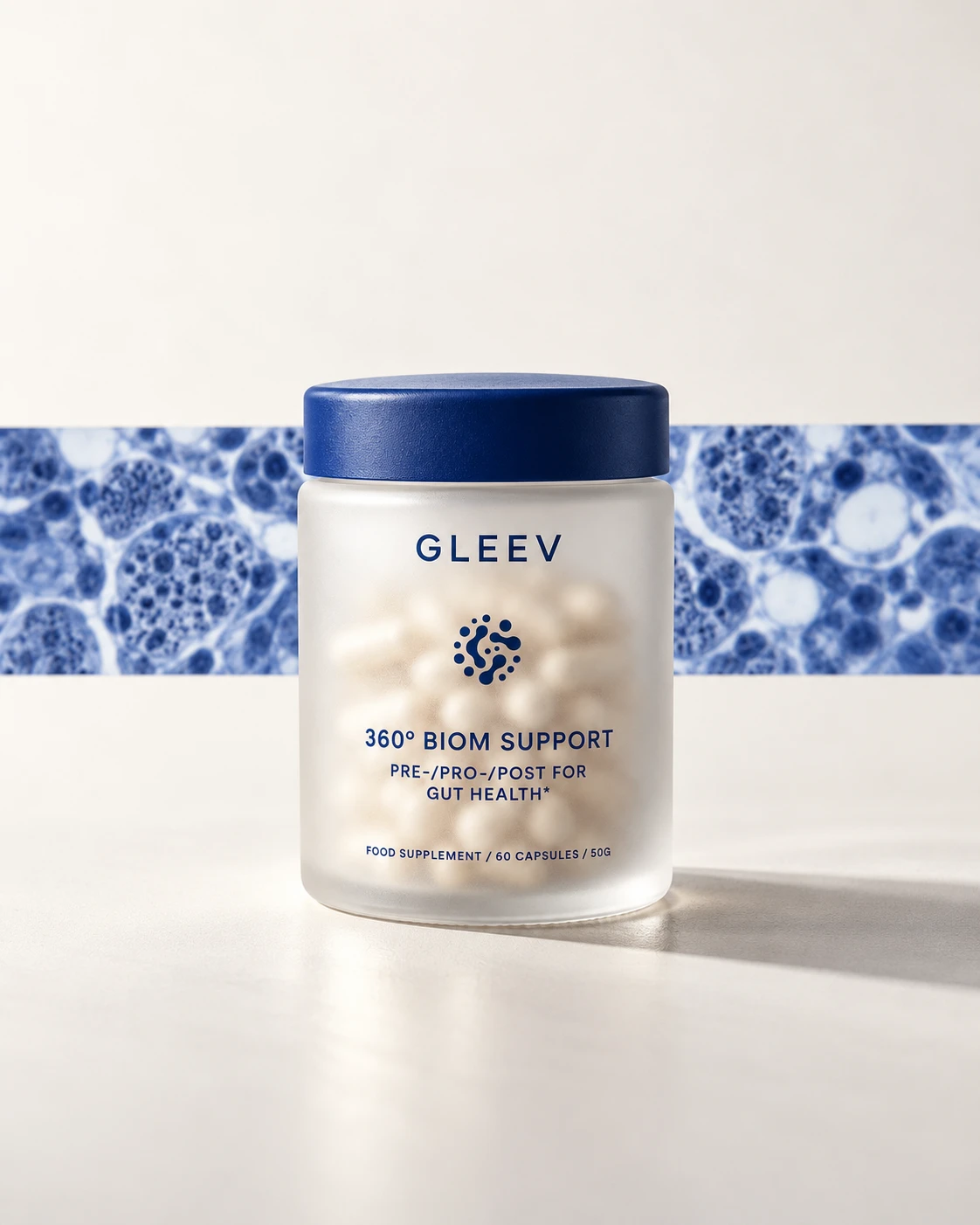 A Gleev jar in front of a microscope image of cells